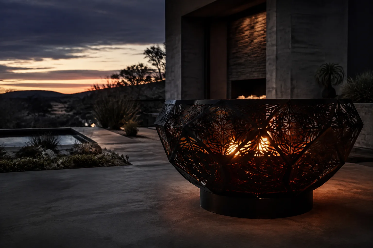 AM Engineering handcrafted ember firepit in steel with glowing embers